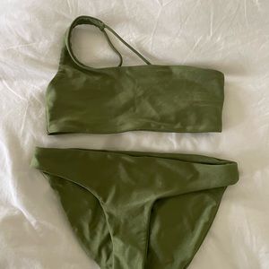 Olive green with a sheen. Worn once, runs small.